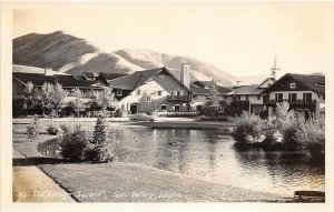 H83/ Sun Valley Idaho RPPC Postcard c1940s Village Square Auto 173