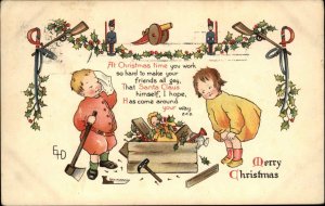Nister Ethel DeWees Christmas Kids Break Open Crate with Toys  c1910 Postcard