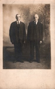 VINTAGE POSTCARD 2 OLDER GENTLEMEN IN SUITS ON REAL PHOTO CARD 1904-1918