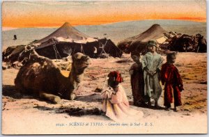 VINTAGE POSTCARD CAMEL AND PEOPLE SCENE IN THE GOURBIS REGION OF ALGERIA c. 1910