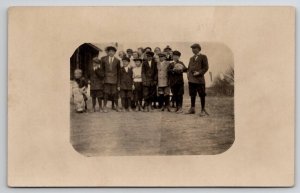 RPPC Children Ready For Ball Game Little One with Large Doll Photo Postcard V26