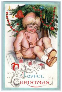 c1910's Christmas Tree Decorated Boy Playing Block Toys Embossed Postcard