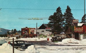 Postcard West Yellowstone Montana Inn Winter MT Conoco Chevron Gas Stations