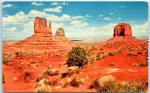 M-58451 Eroded red sandstone buttes Navajo Monument Valley