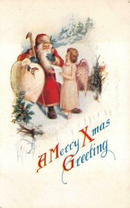 CHRISTMAS HOLIDAY SANTA CLAUS & ANGEL WITH LIST EMBOSSED POSTCARD (c. 1910) PD !