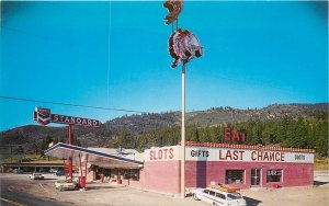 Postcard Nevada Reno Last Chance Coffee Gas Pumps Roberts 23-2857