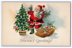 c1910's Christmas Season's Greetings Santa Claus And Toys Present Gift Postcard