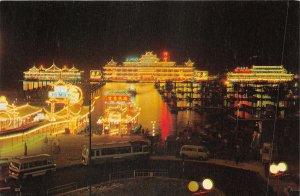 us8363 night scene with floating restaurants aberdeen hong kong