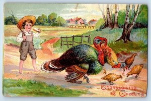 c1910's Thanksgiving Greetings Boy Grazing Turkey Embossed Antique Postcard