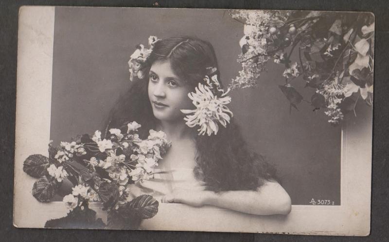 Young Girl Leaning Out Window - Flowers Used 1910s