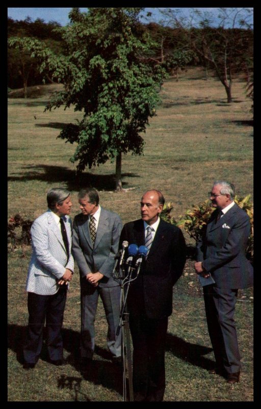 President Carter Speaks with West German Chancellor Helmut Schmidt