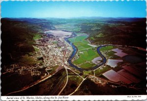 CONTINENTAL SIZE POSTCARD AERIAL VIEW OF ST. MARIES IDAHO AND THE ST. JOE RIVER