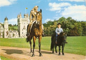 The Queen with Price Andrew in Balmoral. On horses Modern English PC. Contine