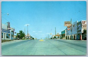 K31/ Shamrock Texas Postcard Chrome Main Street Cars Stores 121