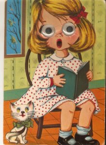 Girl reading book. Cat  Vintage Dutch postcard,  with moving glass eyes