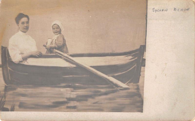 Sylvan Beach New York~Studio Shot~Mom & Baby Girl in Row Boat~Bottle~1905 RPPC