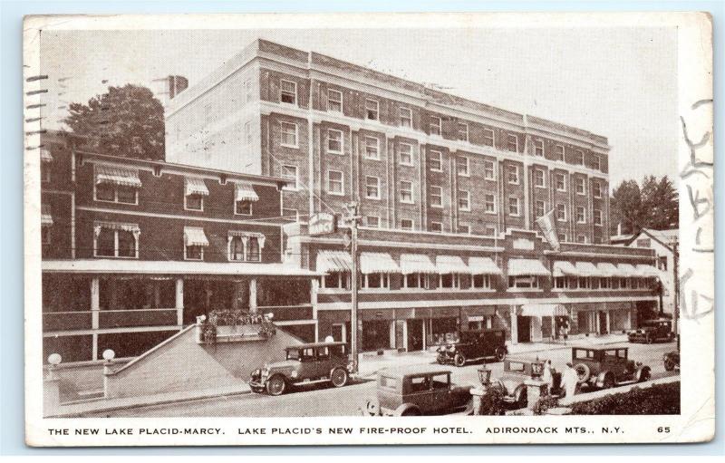 1931 New Lake Placid Fire Proof Hotel Town View Adirondack Mts NY Postcard A95