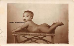 BLACK AMERICANA TODDLER ON TABLE-1935 RPPC REAL PHOTO POSTCARD