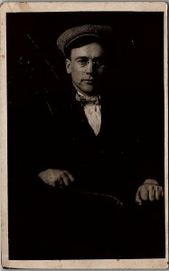 c1920 SHARP DRESSED GENTLEMAN DRIVING CAP BOW TIE REAL PHOTO RPPC POSTCARD 38-62