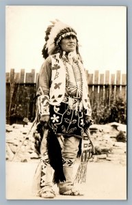 AMERICAN INDIAN CHIEF IN FULL DRESS ANTIQUE REAL PHOTO POSTCARD RPPC