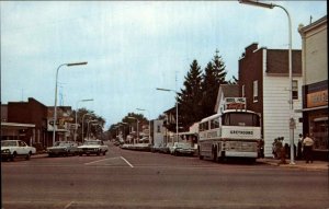 Abbotsford Wisconsin WI Greyhound Bus Coca Cola Street Scene Vintage Postcard
