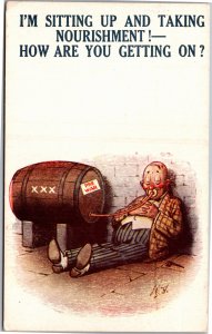 Bamforth Greeting Comic Sitting up and taking nourishment drunk drinking barrel
