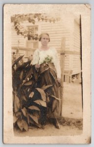 RPPC Lovely Woman Posing With Large Plant Hand Tinted Photo Postcard P26