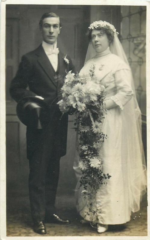 Lot 6 early wedding photo postcards groom & bride