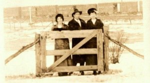 Vintage 1910's RPPC Postcard - Friends in front of Country Fence Trains Distance