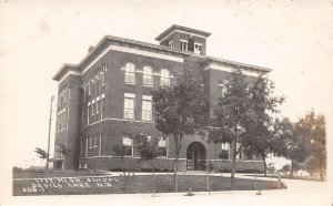 J65/ Devils Lake North Dakota RPPC Postcard c1910 City High School 242