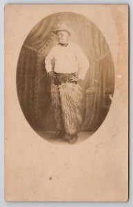 RPPC American Cowboy in Wooly Chaps Studio Photo c1905 Real Photo Postcard L35