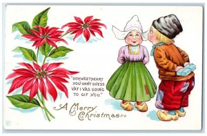 c1910's Christmas Dutch Kids With Gift Poinsettia Flowers Embossed Postcard