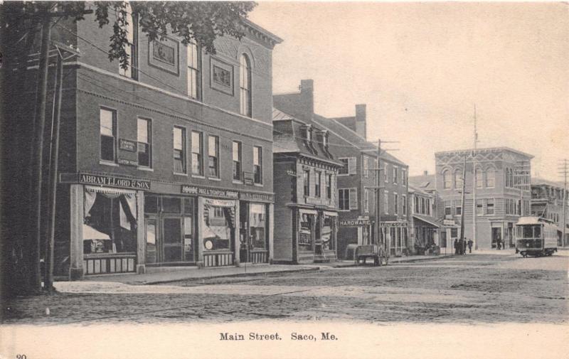 SACO MAINE~MAIN STREET STOREFRONTS~TROLLEY~H C LEIGHTON #20 PUBL POSTCARD 1900s
