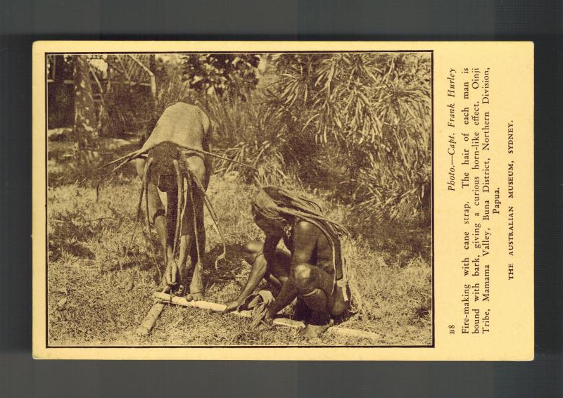 Mint New Guinea BW RPPC Postcard native Men Starting Fire with Cane Strap Papua