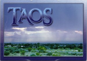 VINTAGE CONTINENTAL SIZE POSTCARD TAOS NEW MEXICO TREES HOUSES SKY VIEW SCENE