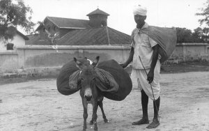 A833 India Dohki Bhiwani Donkey Ethnic Man Native RPPC postcard