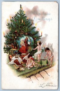 1910's CHRISTMAS GREETINGS HOLY FAMILY ANGELS TREE CANDLES TOYS GUN POSTCARD