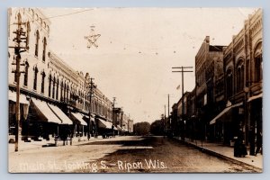 J90/ Ripon Wisconsin RPPC Postcard c1910 Main Street Stores  703
