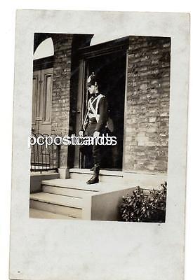 RealPhoto Postcard of a very young man posed in uniform