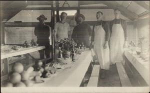 US Army - Inside Tent Deocrated Table Fruit & Bottles c1910 RPPC