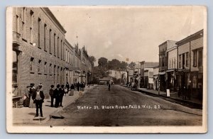 J90/ Black River Falls Wisconsin RPPC Postcard c1910 Water Street Stores Men 350