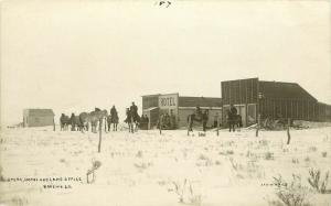 RPPC Postcard Store Hotel and Land Office Brushie SD Eastern Meade County