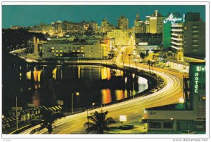 Lake Pancoast along Collins Avenue at Night, in tropical Miami Beach, Florida...