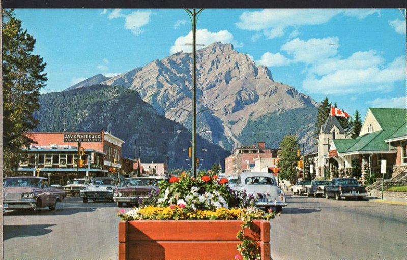 AB BANFF Main Street w/Cascade Mountain in background pm1969old cars 1950s-1970s