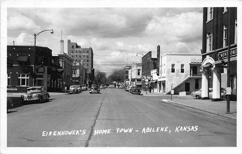 Abilene KS Street View Store Fronts Old Cars  Eisenhower's Home RPPC Postcard