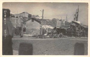 RPPC CHINA SHIP HARBOR MILITARY WRECKAGE REAL PHOTO POSTCARD (c. 1920s)