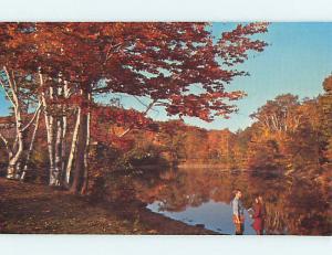 Pre1980 GREETINGS FROM - COUPLE BY LAKE ON A FALL MORNING Oneonta NY r9306