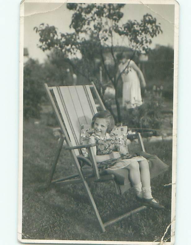 rppc 1940's Midcentury Modern NICE VIEW OF GIRL ON WOOD FRAME LAWN CHAIR AC8521