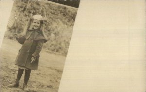 Patriotic Girl Pigtails American Flags Giving the Bird Unusal c1910 RPPC