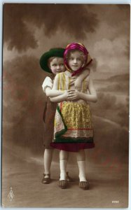 c1900s Adorable Little Boy Hugs Cute Girl RPPC Hand Colored Dress PFB Photo A148